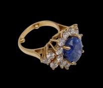 A vintage ladies French hallmarked gold openwork cluster ring with central 3.9ct oval or cushion cut