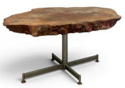 A vintage Brutalist style scratch built coffee table with live edge London plane tree top raised