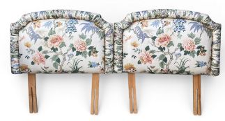 A pair of headboards in padded and piped Anschun Chintz. (New and unused for standard 3ft single