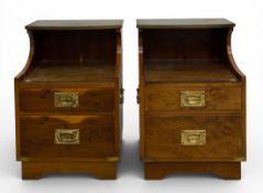 A pair of military campaign style brass bound yewwood bedside cabinets with carrying handles. H.58