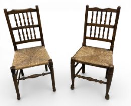 Two 19th century elm Lancashire style dining chairs with spindle backs on rush seat H.96 W.46 D.37cm