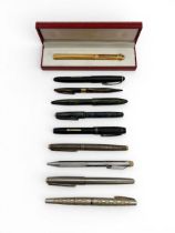 A miscellaneous collection of vintage pens to include a cased Must de Cartier ballpoint pen, a