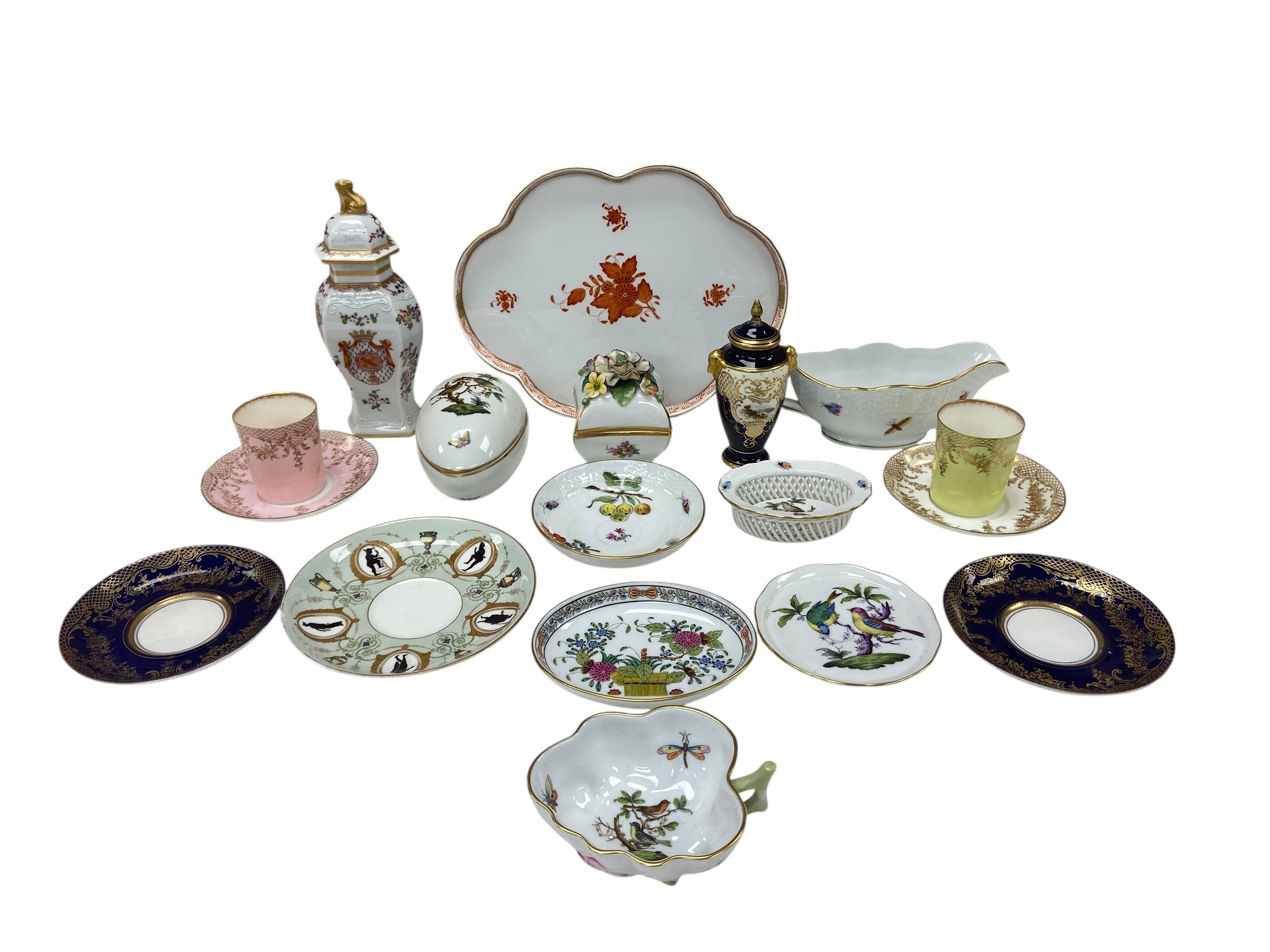 A mixed collection of Herend and other hand decorated porcelain items.