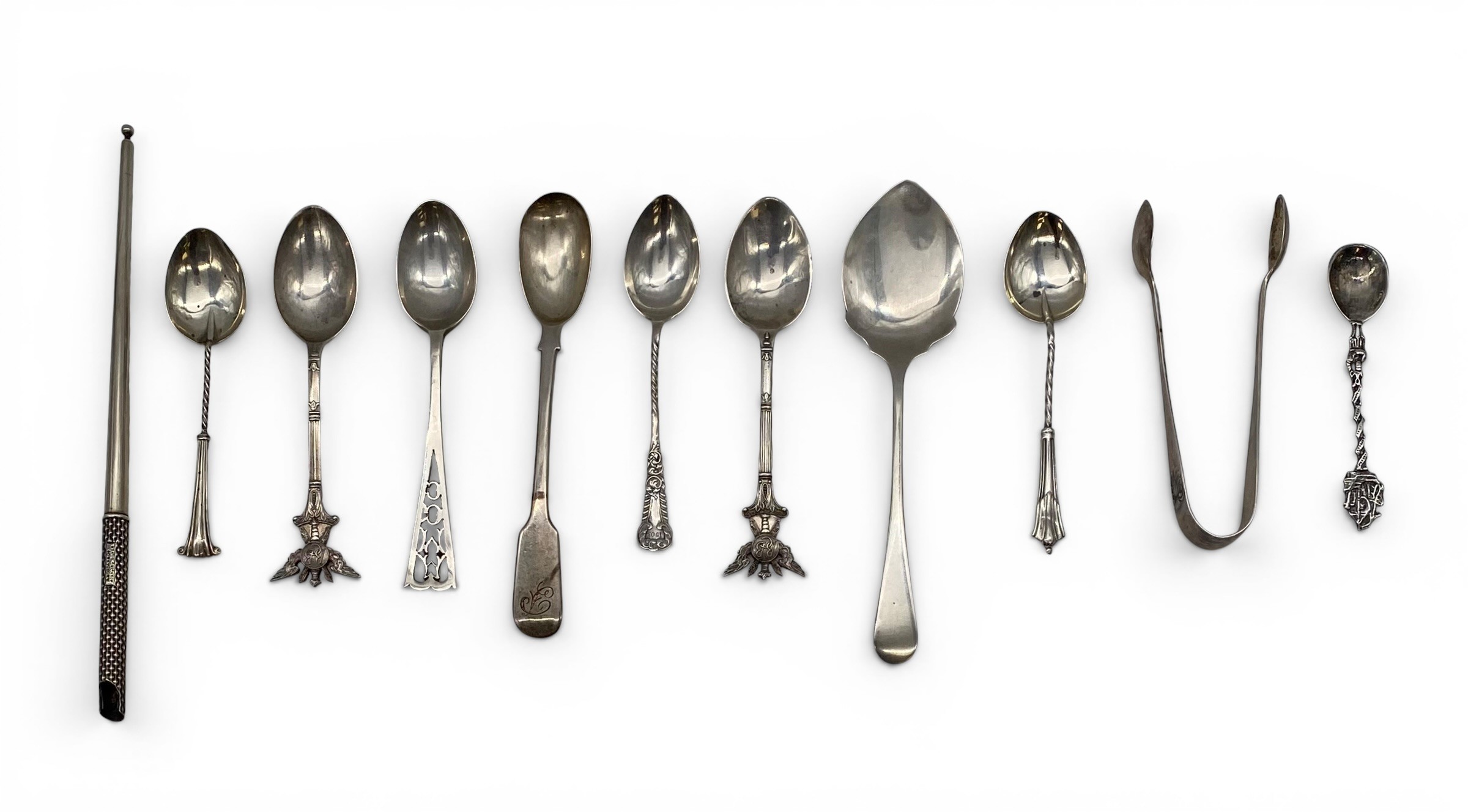 A miscellaneous collection of English hallmarked silver spoons and other items. 124g