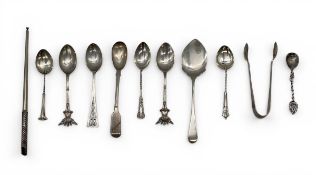 A miscellaneous collection of English hallmarked silver spoons and other items. 124g