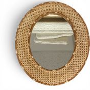 A vintage wall mirror with oval plate in a ceramic, faux bamboo and rattan frame. H.64 W.54cm