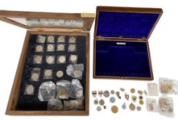 A mixed lot of vintage coins, badges and stamps together with a fitted mahogany cutlery box and