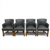 A set of four 20th century grey leather upholstered tub armchairs raised on straight stretchered