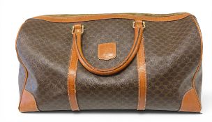 A vintage coated canvas and tan leather Celine Macadam Triomphe Boston duffle bag. H.50 W.43cm