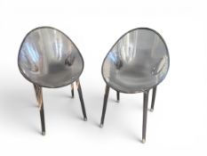 A pair of Mr Impossible chairs by Kartell designed by Philippe Stark with maker's mark. H.84cm.