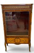 A Louis XV style ormolu mounted and marquetry inlaid kingwood vitrine or bookcase with glazed