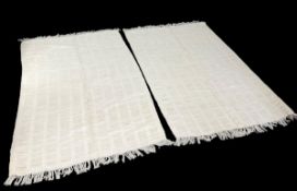 A pair of contemporary white flatweave rugs. H.183 W.120cm