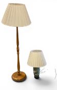 A vintage Chinese table lamp of baluster form with hand painted decoration and a teak standard lamp.
