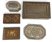 A collection of five Syrian inlaid boxes with hinged lids and lined interiors. H.30 W.18cm