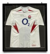 A vintage Steve Thompson signed, match worn Nike England Rugby Shirt with O2 sponsor and embroidered