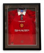 A vintage 1996-98 David Beckham signed Manchester United Football Club Umbro home shirt with Sharp