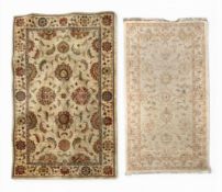 A contemporary John Lewis rug together with one other. L.168 W.106cm Largest