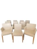 A set of ten calico upholstered Maxalto dining chairs raised on tapered beech supports by Antonio