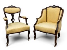 A 19th century French mahogany salon armchair with carved cresting over the shaped back and