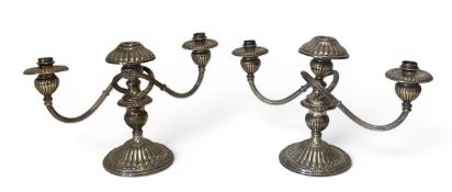 A pair of vintage Peruvian 925 marked silver Camusso candelabras each with a central reeded candle