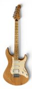 A vintage Yamaha Pacifica electric guitar in a natural finish with maple fretboard and soft travel