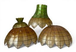 A pair of large 1970s Tiffany style capiz shell lampshades together with three others. Dia.50cm