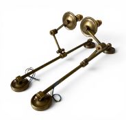 A pair of vintage style articulated brass wall sconces with Fortuny fabric shades. H.54cm each
