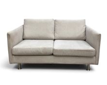 A contemporary Beige Arezzo fabric upholstered two seater Indivi sofa by BoConcept with a maker's