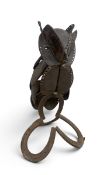 An owl figure welded from heavy metal plates and shire horseshoes. H.60 x W.32