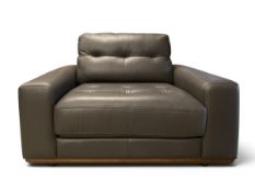A modern mid century style armchair from the G-Plan vintage range in dark grey upholstery H.80 x W.