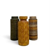 A collection of three mid-century West German vases of cylindrical form. Each approx H.43cm x W.16cm