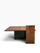 A 1980's vintage Italian dining table in a lacquered geometric burr elm finish resting on ebonised