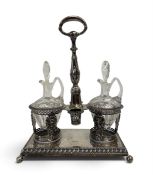 A Georgian silver plated oil and vinegar cruet stand with cut glass pouring jugs with stoppers,