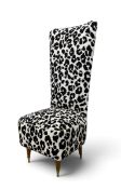 A contemporary high back hall chair with densely hand embroidered beads to give an allover animal