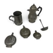 A set of three 19th century graduating pewter flasks with screw tops along with a pewter ladle,