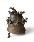 A 19th century bronze Ashanti kuduo decorated with mice and birds resting on four paw supports. H.23