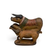 A terracotta figure of a standing pig, signed and dated to the underside along with a polychrome