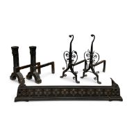 A pair of 19th century cast iron fire dogs, a similar pair and a 19th century cast iron fire kerb.