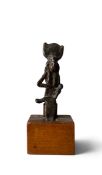 A late period Egyptian bronze figure of a seated Isis with child Horus on her lap. H.8.5cm x W.3.5cm