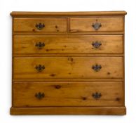 A 19th century chest of two short over three long graduating drawers raised on a square plinth base.