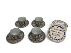 A set of four late 19th century Chinese Famille Rose hand painted octagonal cups and saucers and a