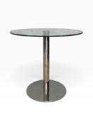 A contemporary dining table with plate glass top on chrome base. H.74cm x D.80cm