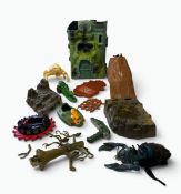 A collection of 1980's Mattel Masters of the Universe toys, including Castle Greyskull etc.