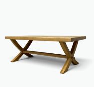 A contemporary hardwood low table on stretchered X-frame supports. H.45 x W.120 x D.60cm