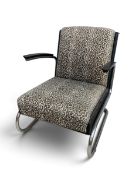 A vintage Bauhaus inspired Mucke Melder lounge chair in animal print upholstery on chrome base. H.75