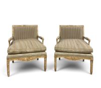 A pair of contemporary Empire style open armchairs with wide squab seats in plush velvet Regency