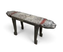 A carved and polychrome painted stool in the form of a two headed leopard. H.45 x W.99 x D.23cm