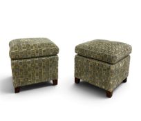 A pair of contemporary stools in geometric upholstery on block feet. H.52 x W.52 x D.52cm
