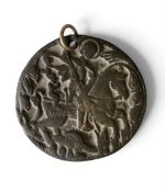 A bronze medallion depicting St. George slaying the dragon, possibly 18th century Russian. 6cm
