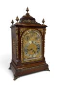 A large and impressive early 20th century gilt bronze mounted mahogany bracket clock with flame